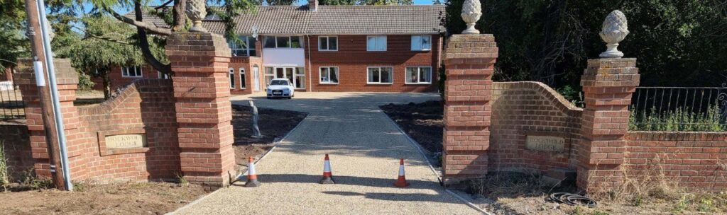 This is a photo of a newly installed chip and tar driveway, installed by St Neots Driveways